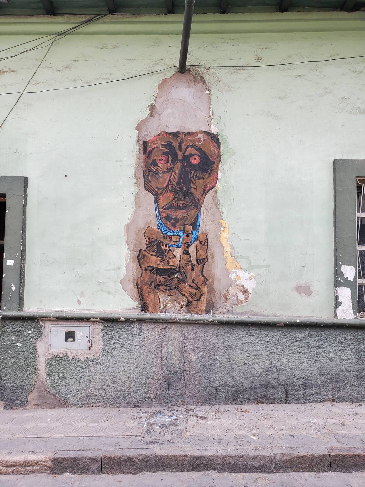 Guayasamín perdiendo la mascarilla